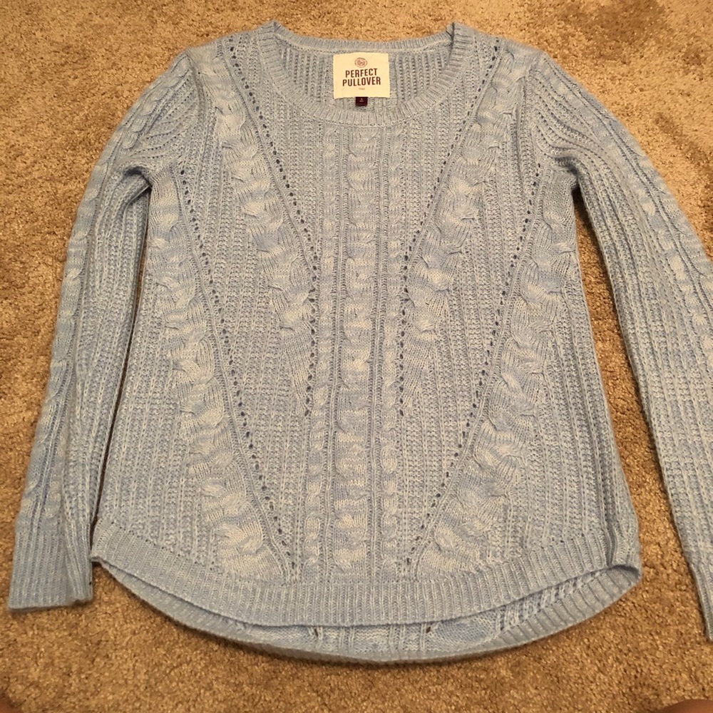 light blue sweater and undershirt